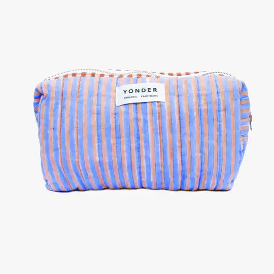 Blue and pink striped pouch with 'Yonder' label on a white background