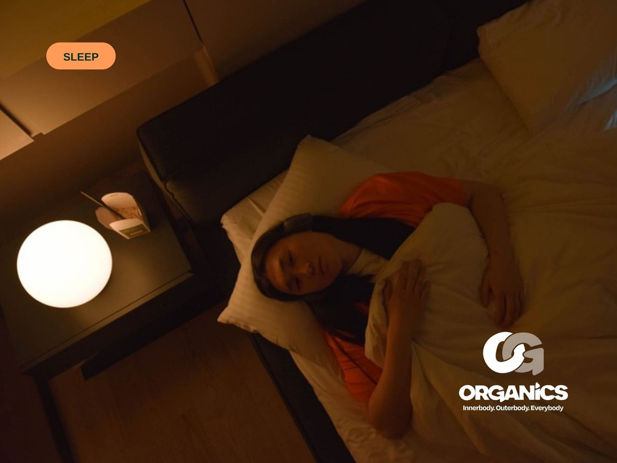 Woman lying awake in bed at night