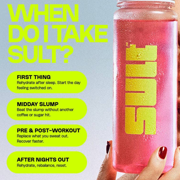 Pink SULT energy drink bottle held by a hand with text about when to take it.