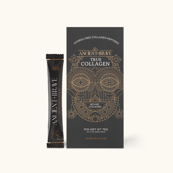 Ancient + Brave True Collagen sachet beside box packaging on white background; grass-fed bovine collagen peptides, 15 servings.

