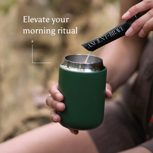 Person pours Ancient + Brave collagen powder from a sachet into a travel mug outdoors, with a morning routine message on image.

