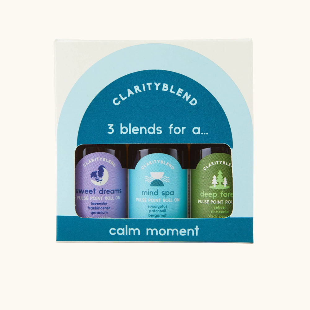 Clarity Blend Calm Moment aromatherapy roll-on set with three pulse point blends—Sweet Dreams, Mind Spa and Deep Forest—in box.

