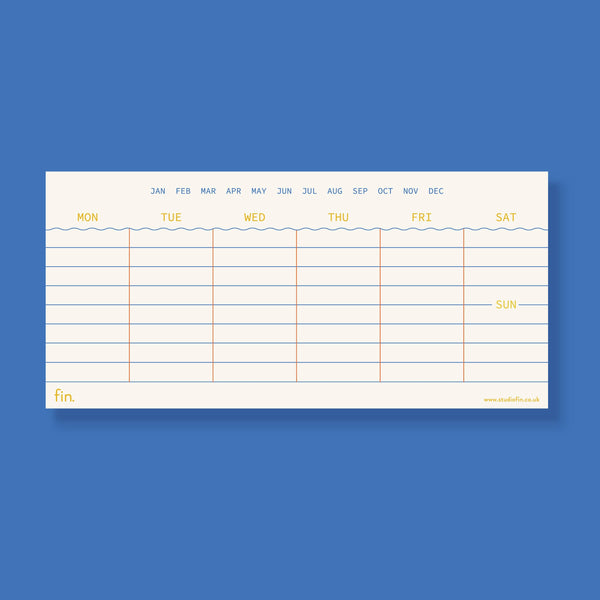 Weekly planner pad with grid layout on a blue background